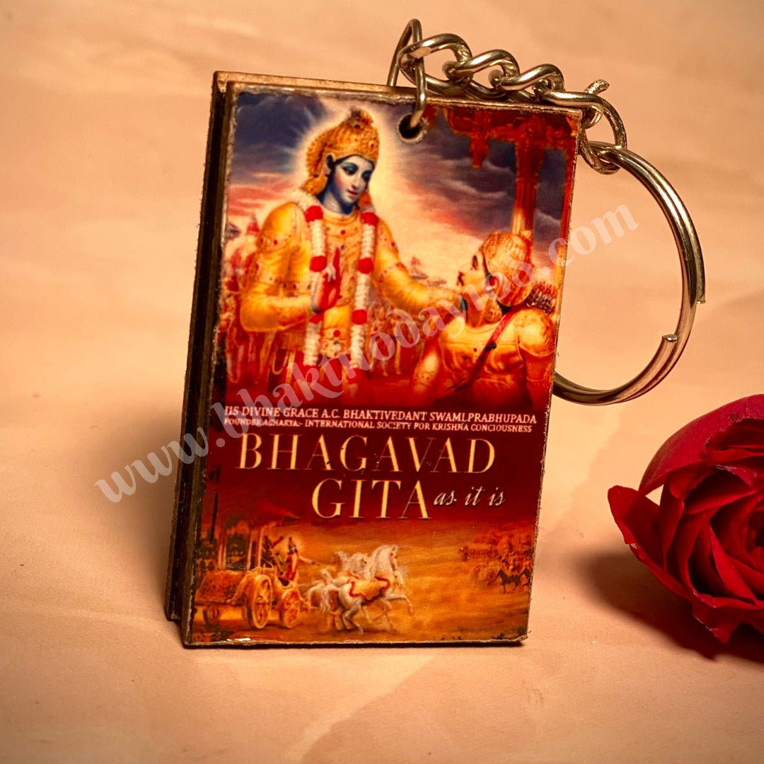 Bhagavad Gita keyring featuring a miniature scripture design, symbolizing divine wisdom and devotion—ideal for daily use or as a spiritual gift.