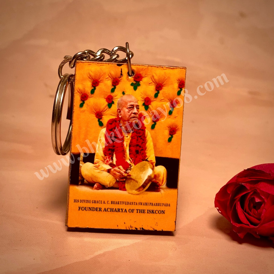 Bhagavad Gita keyring featuring a miniature scripture design, symbolizing divine wisdom and devotion—ideal for daily use or as a spiritual gift.
