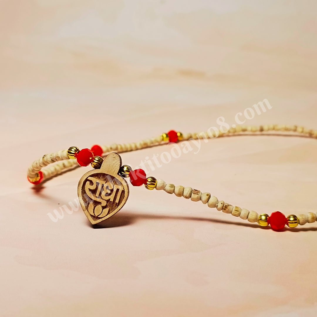 Radha Naam Golden Tulsi Mala with red and golden beads and a small Radha Naam locket – handcrafted spiritual necklace made from pure Tulsi wood.