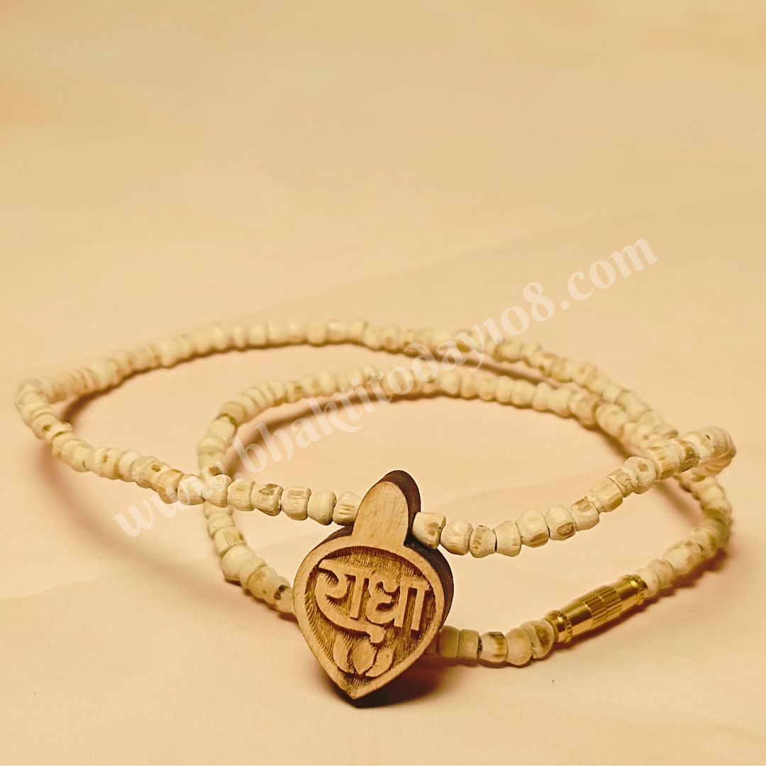 Vrindavan Tulsi Mala with Radha Naam engraved locket – handcrafted pure Tulsi beads from Vrindavan, symbolizing Radha Rani’s love, protection, and spiritual energy.