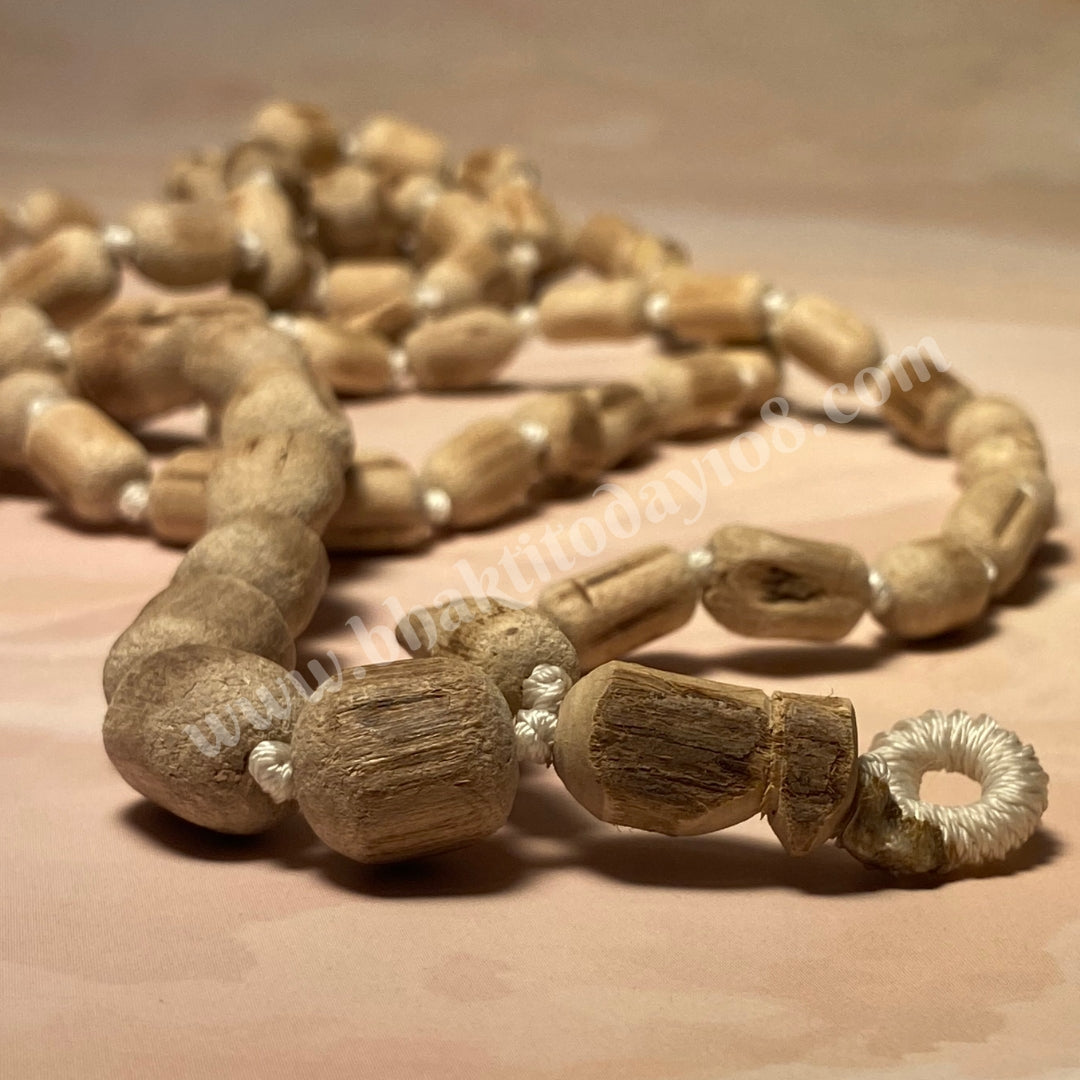 Cylindrical Pure Tulsi Japa Mala with 108 beads, ideal for mantra chanting and meditation practices.