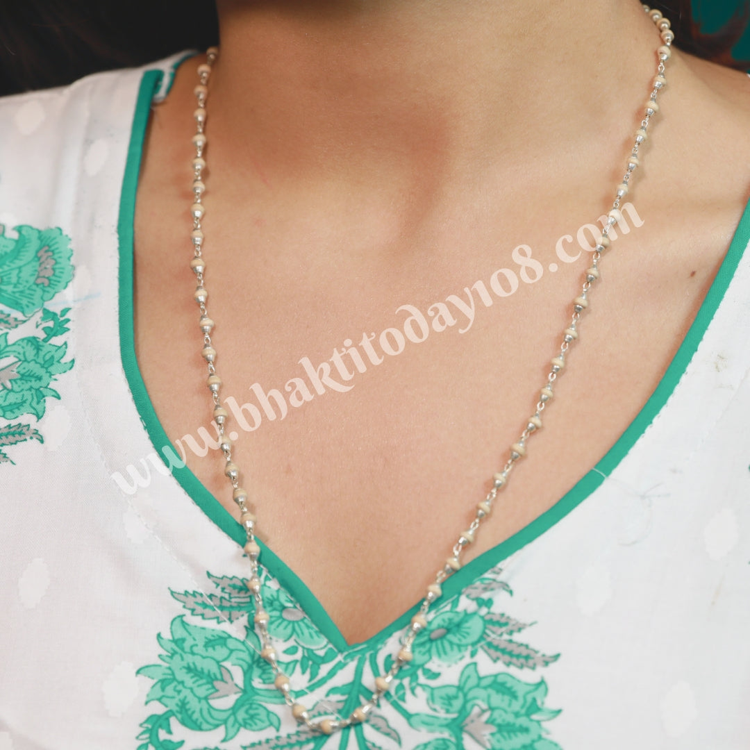 Sterling silver chain featuring small, round Tulsi seed beads.