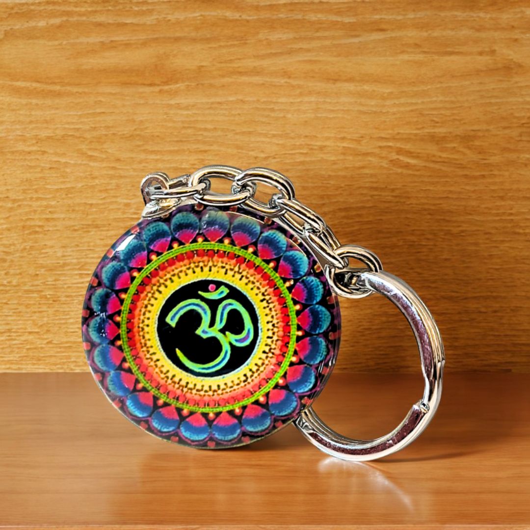 Metal Om keychain with intricate design, symbolizing spiritual harmony and divine energy—perfect for keys, bags, or as a sacred gift.