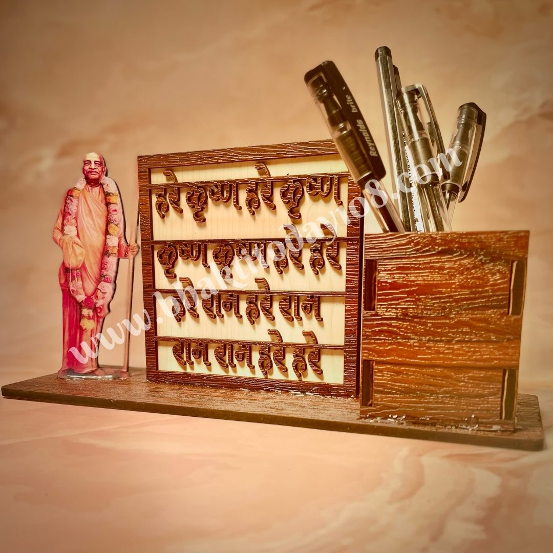 Elegant pen stand featuring a detailed image or idol of Srila Prabhupada, perfect for desktops, combining utility with spiritual inspiration.