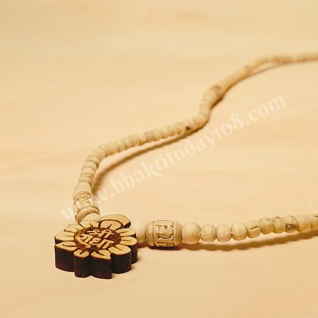 Handcrafted Radha Naam Tulsi Mala made with pure Tulsi wood beads, ideal for chanting, meditation, and spiritual protection, infused with Radha Krishna's blessings from Vrindavan.