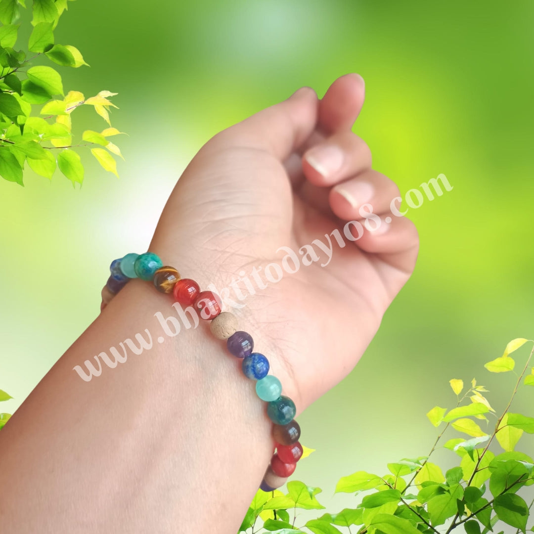 Seven Chakra bracelet with natural stones and sacred Tulasi bead for spiritual healing, energy balance, and protection – unisex handmade jewelry.