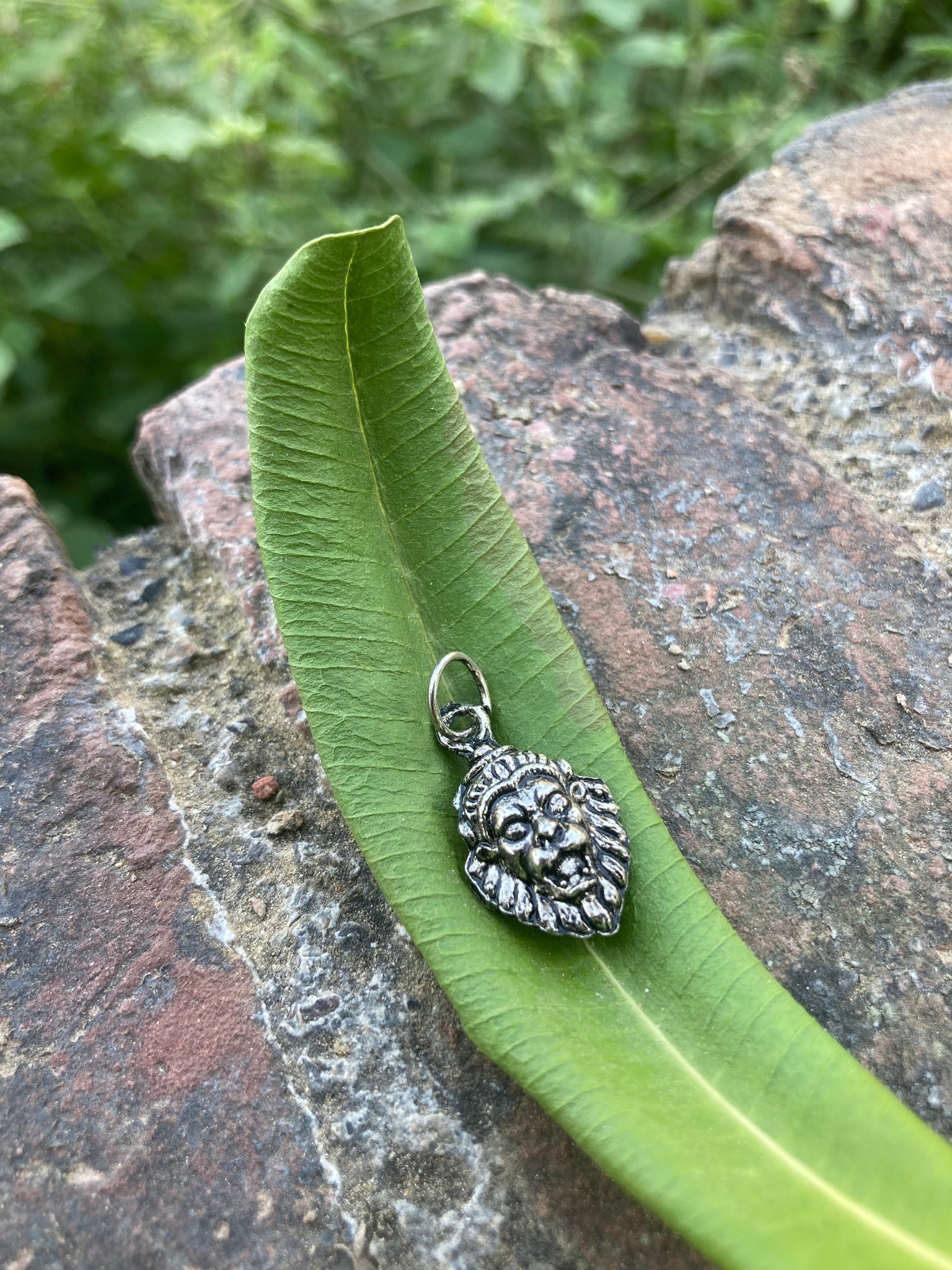 Protective metal locket featuring Lord Narasimha Deva in a powerful form, ideal for daily wear and spiritual protection.