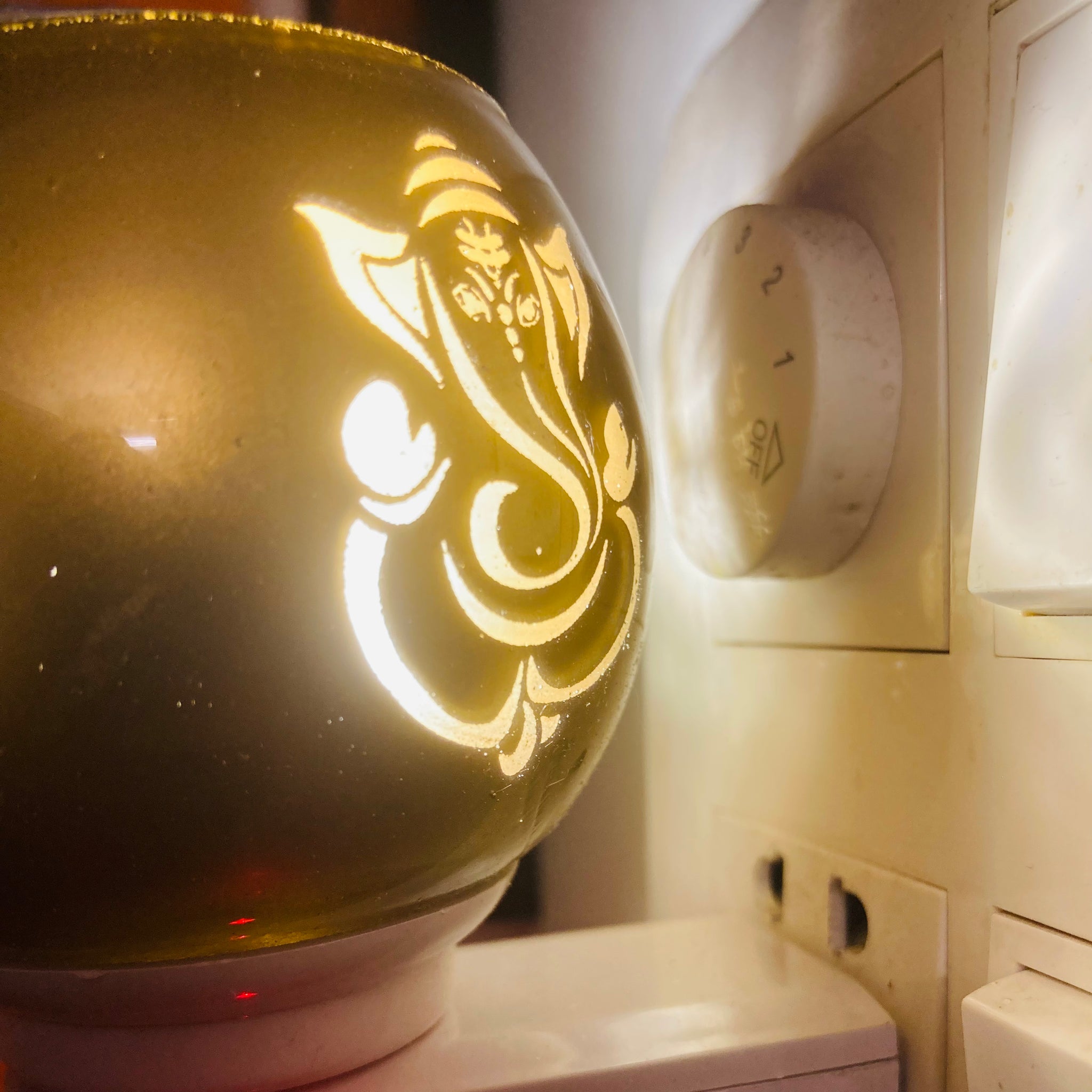 Multi-purpose night lamp with built-in camphor burner (Kapoor Daani), designed for gentle lighting and aromatic diffusion of camphor or essential oils.