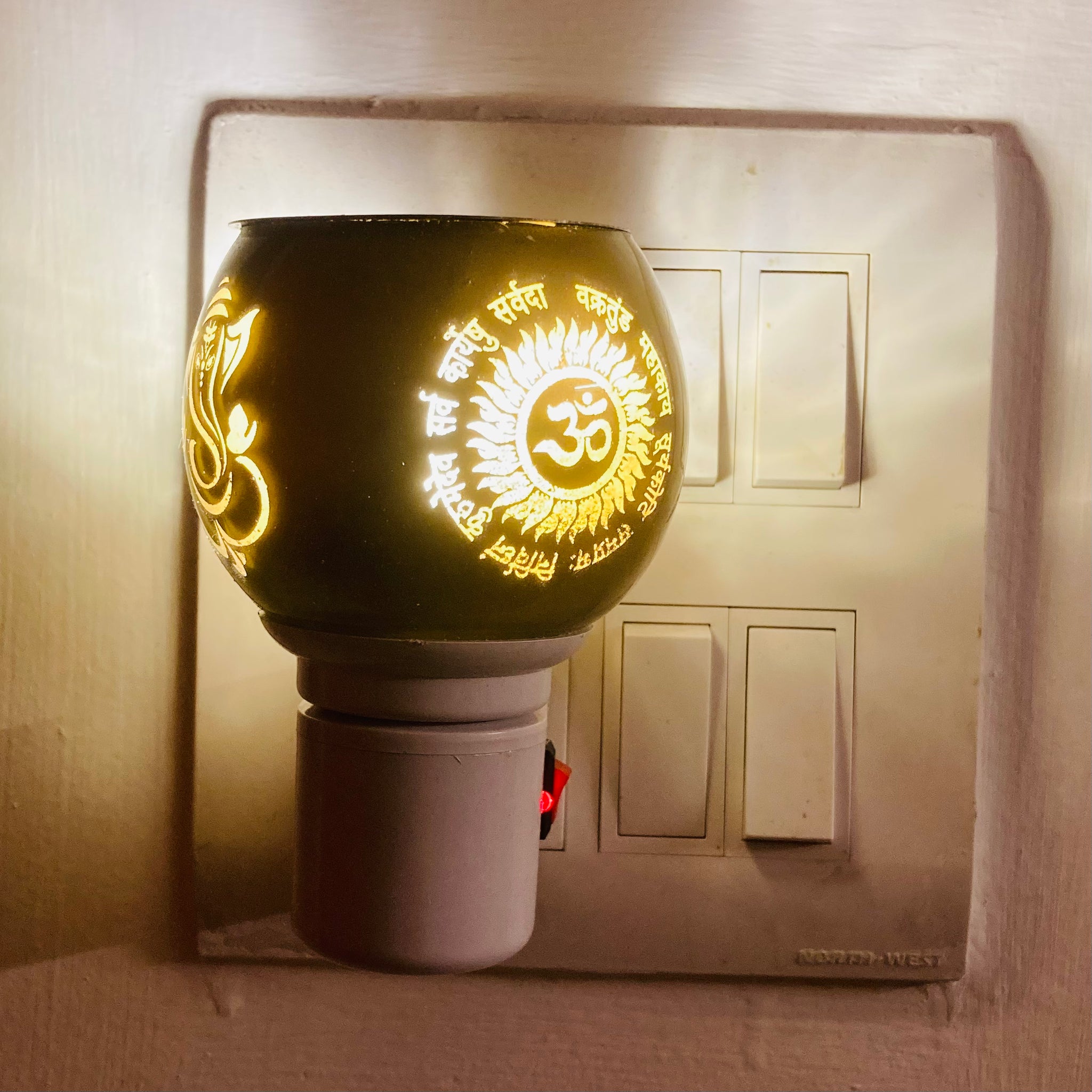 Multi-purpose night lamp with built-in camphor burner (Kapoor Daani), designed for gentle lighting and aromatic diffusion of camphor or essential oils.