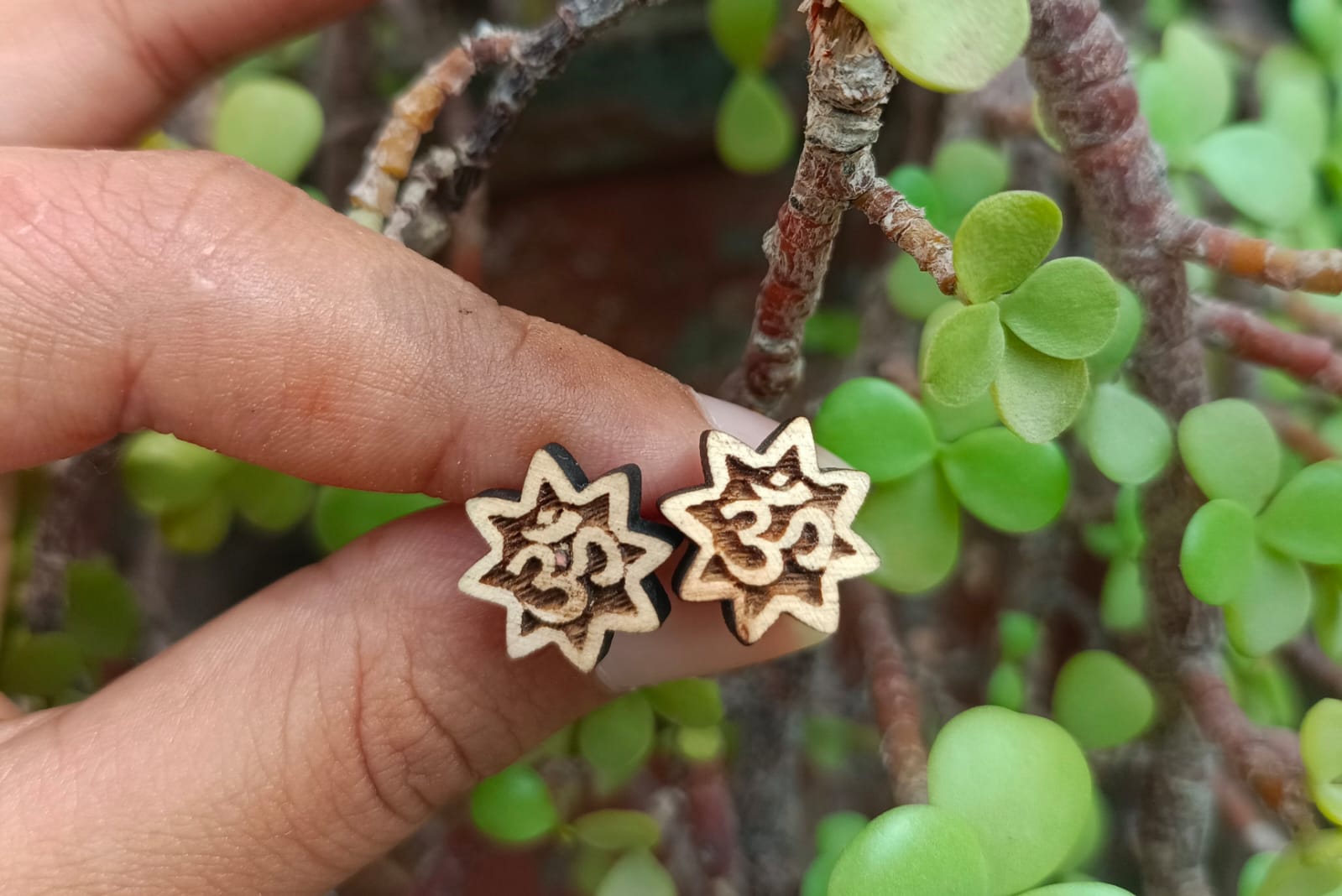 Om Tulsi ear studs handcrafted from pure Tulsi wood, featuring the sacred Om symbol for spiritual seekers and Krishna devotees