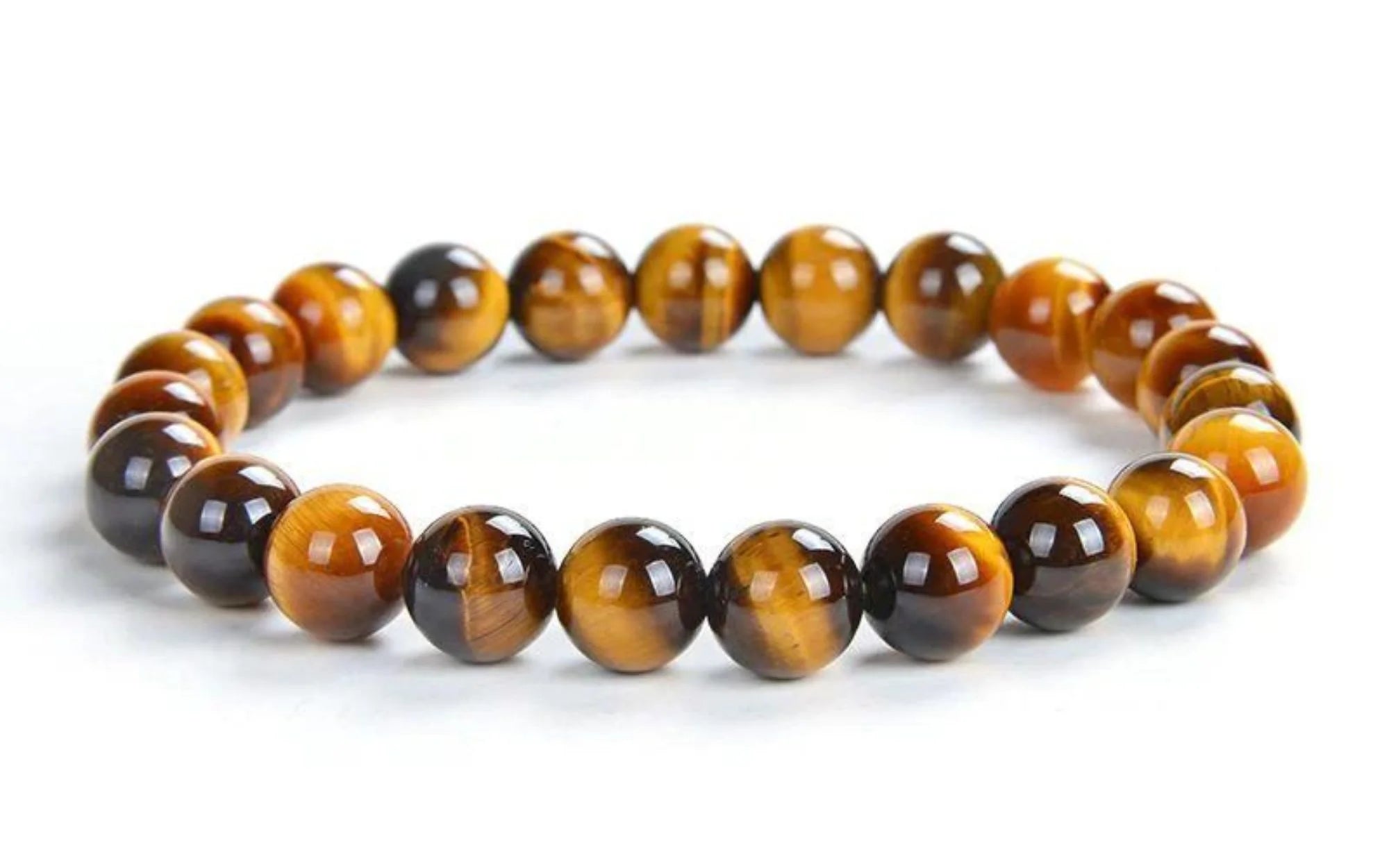 Natural tiger eye stone bracelet – polished gemstone jewelry for protection, confidence, and grounding energy, suitable for daily wear.