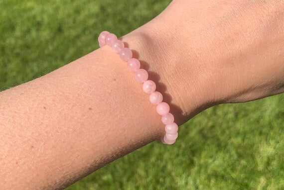 Rose Quartz crystal bracelet for love, self-love, and emotional healing – elegant stretchable gemstone jewelry for daily wear and spiritual energy.