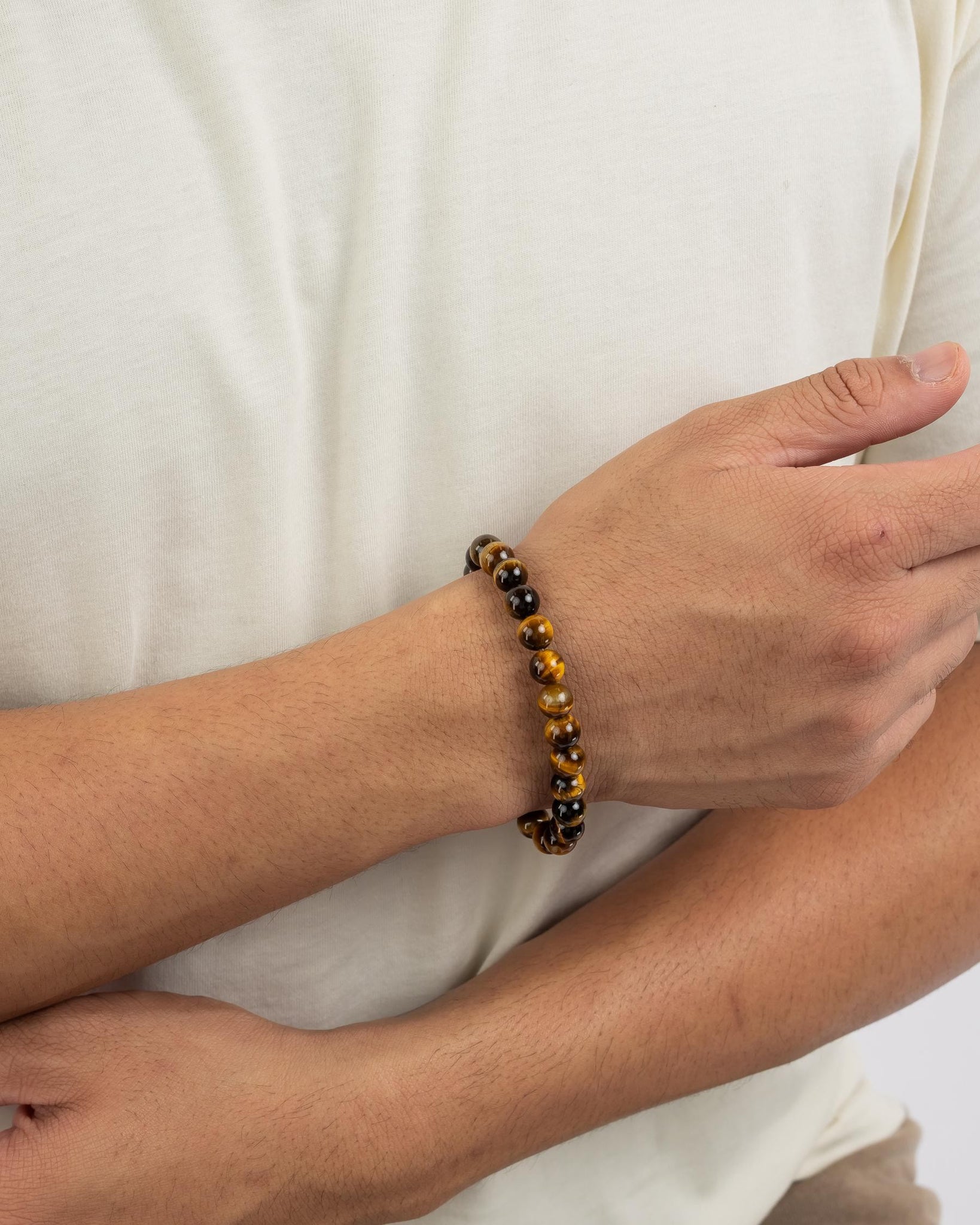 Natural tiger eye stone bracelet – polished gemstone jewelry for protection, confidence, and grounding energy, suitable for daily wear.