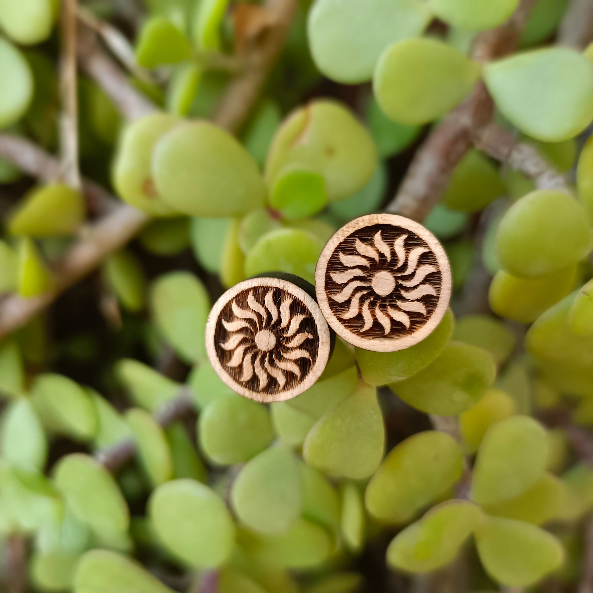 Chakra Tulsi ear studs handcrafted from original Tulsi wood, featuring sacred chakra symbols for energy balance and spiritual wellness.