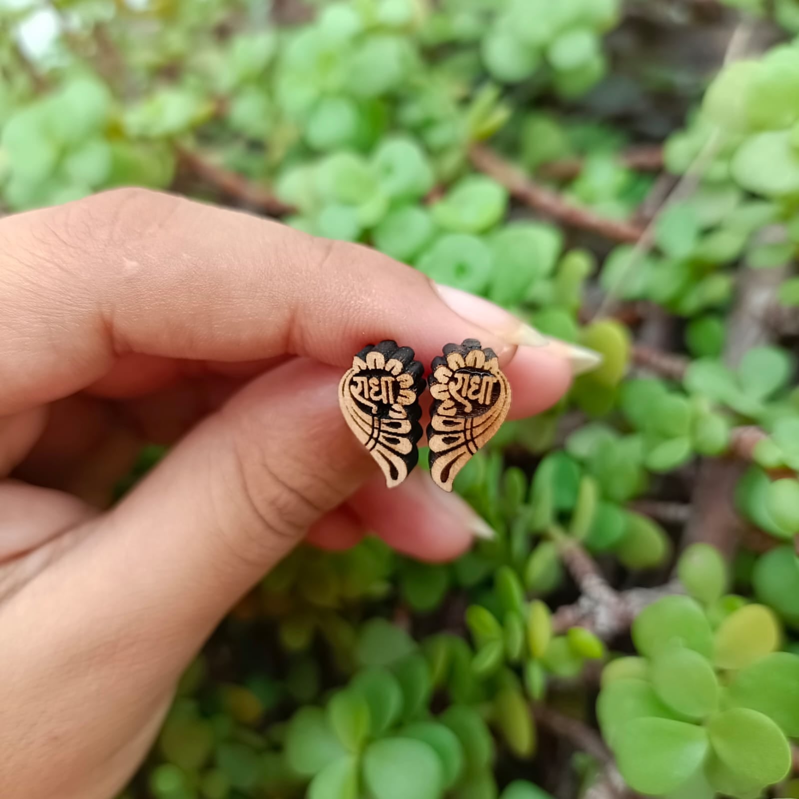 Radha Naam Tulsi ear studs handcrafted from pure Tulsi wood with sacred Radha engraving, spiritual earrings for Krishna devotees.