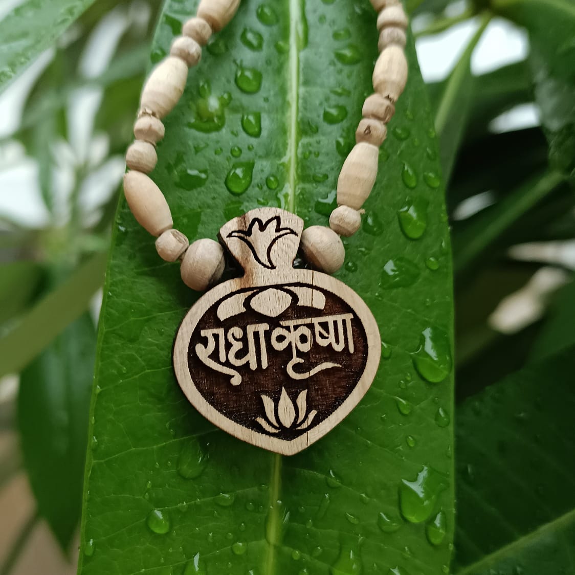 Radha Krishna Tulsi Kanthi Mala – Pure Vrindavan Tulsi beads with Radha Krishna locket, symbolizing divine love, devotion, and spiritual connection.