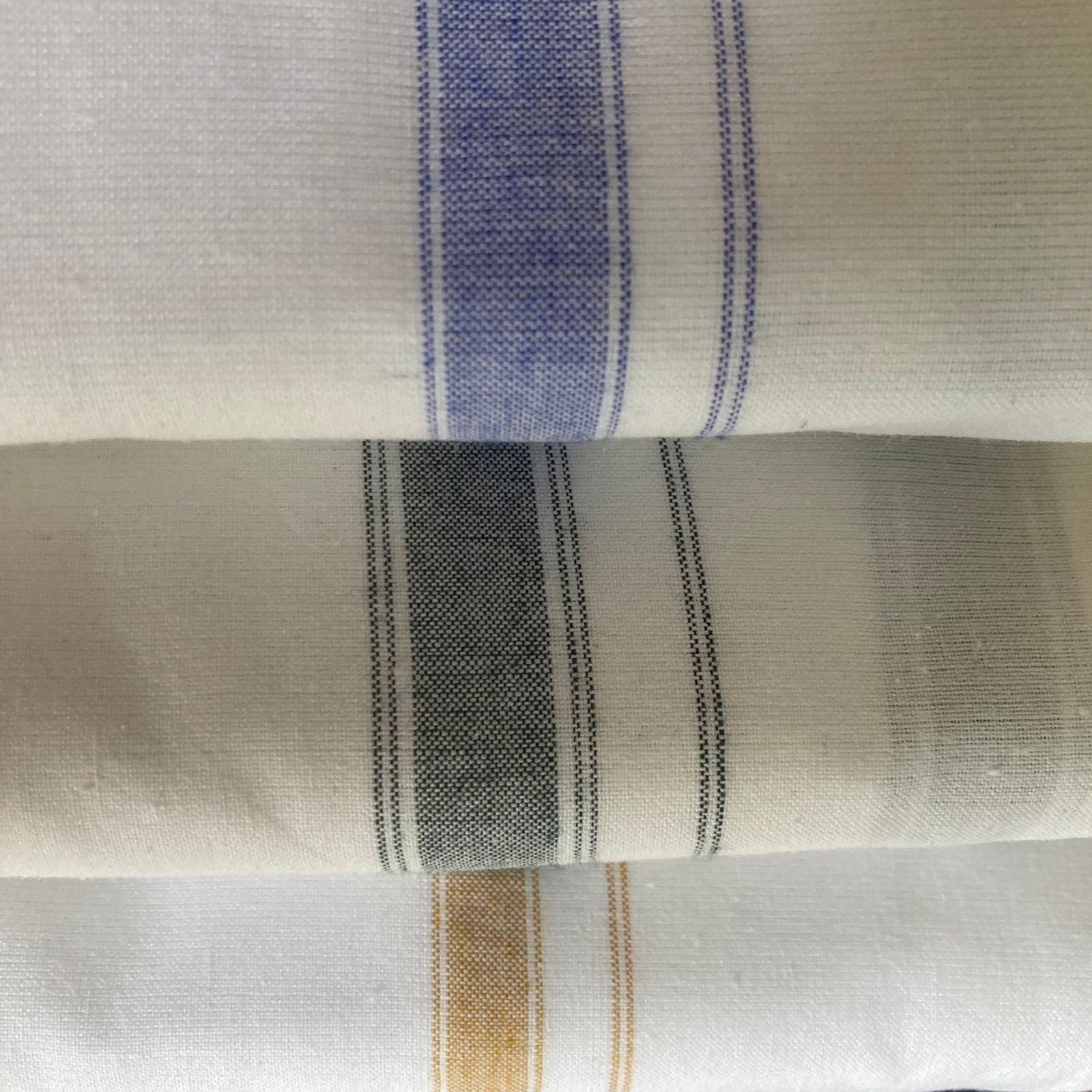 Traditional men's cotton dhoti made from soft, breathable fabric, featuring a simple and elegant design ideal for religious ceremonies, festivals, or everyday ethnic wear.