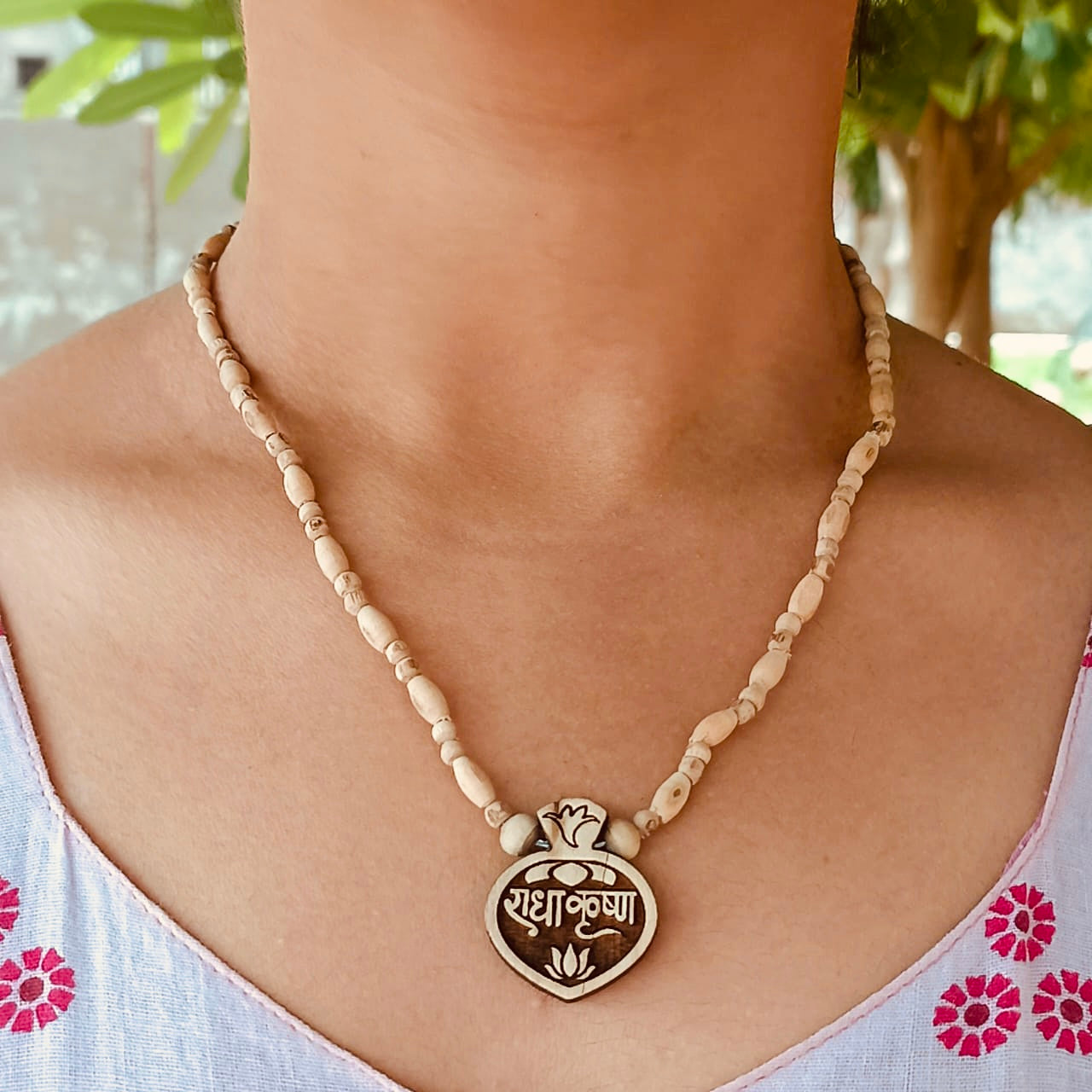 Radha Krishna Tulsi Kanthi Mala – Pure Vrindavan Tulsi beads with Radha Krishna locket, symbolizing divine love, devotion, and spiritual connection.